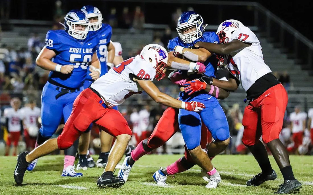 High school football game action — Tampa Bay