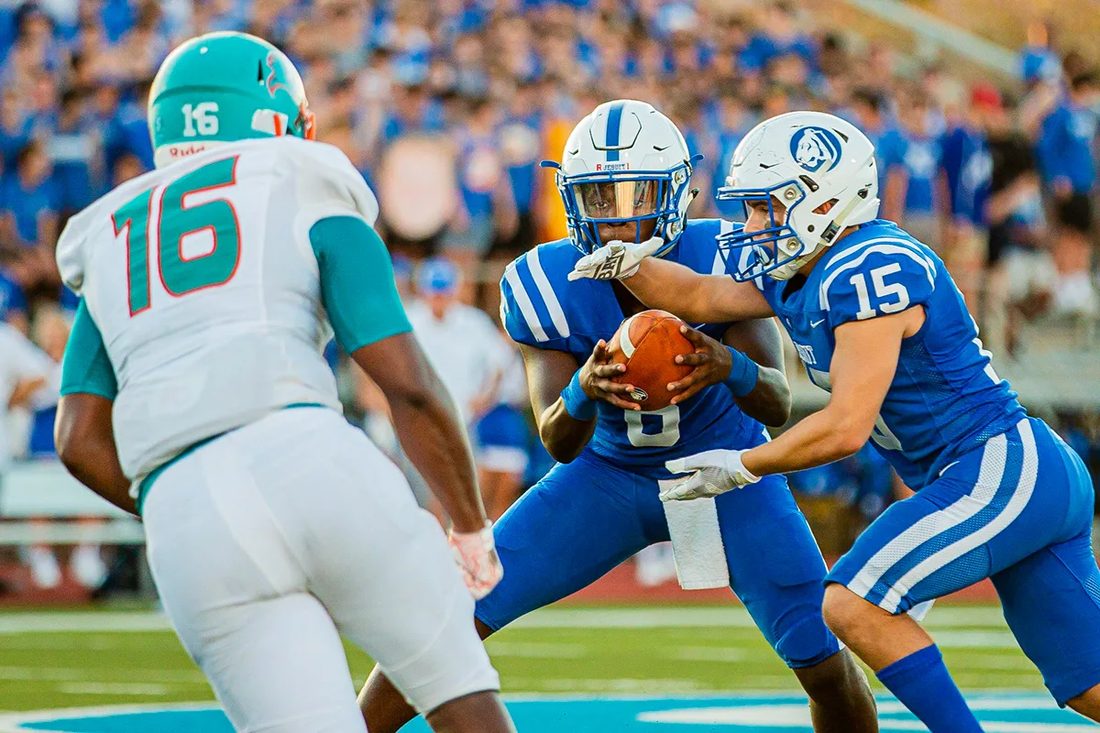 High school football game action — Tampa Bay