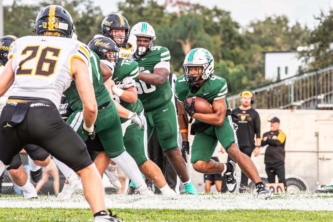 High school football game action — Tampa Bay