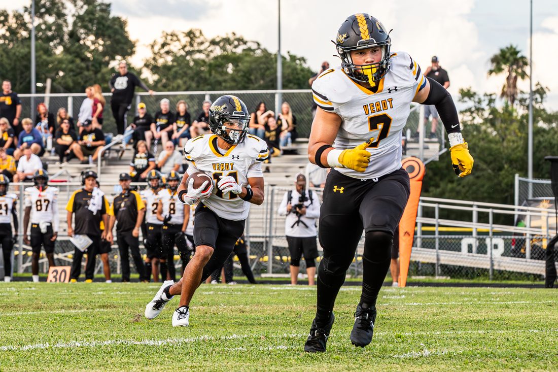 High school football game action — Tampa Bay