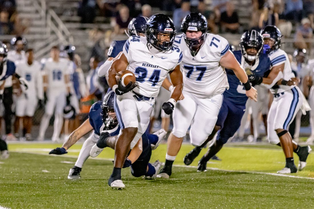 High school football game action — Tampa Bay