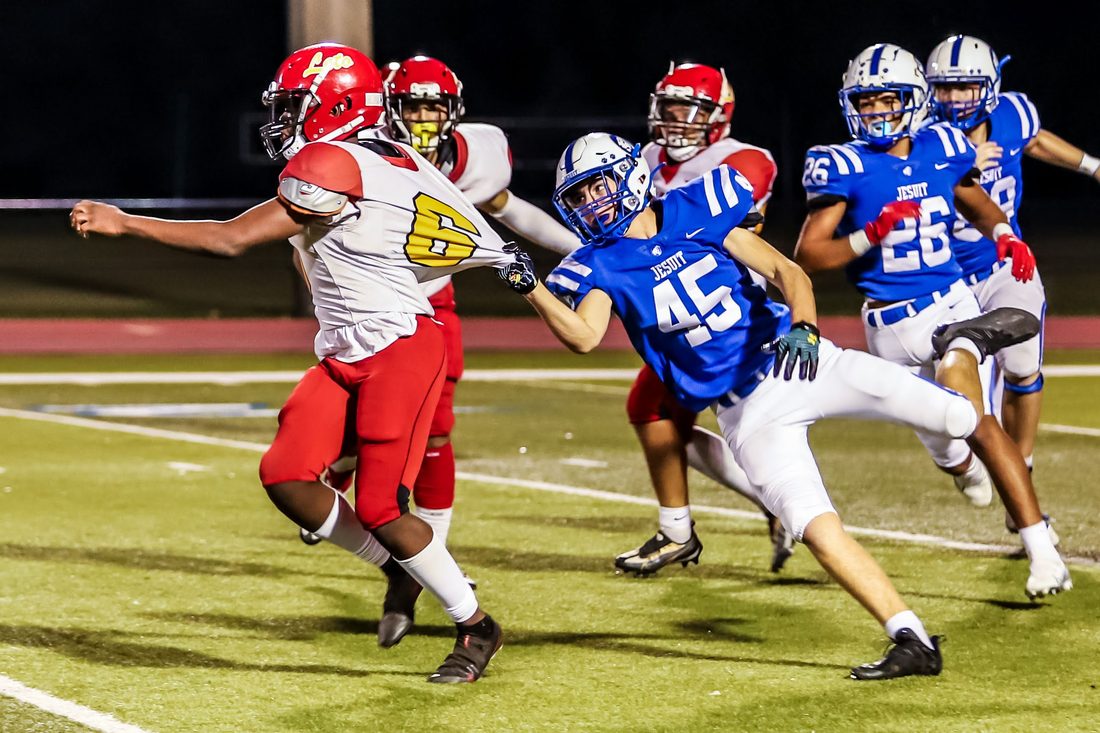 High school football game action — Tampa Bay