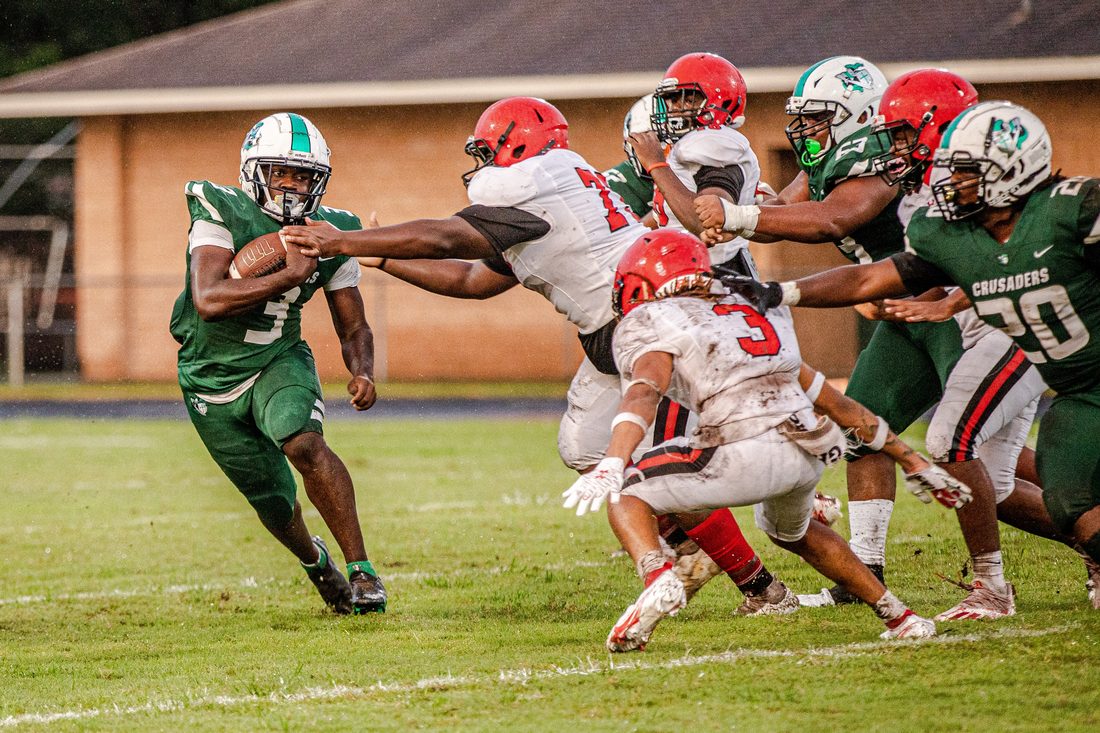 High school football game action — Tampa Bay