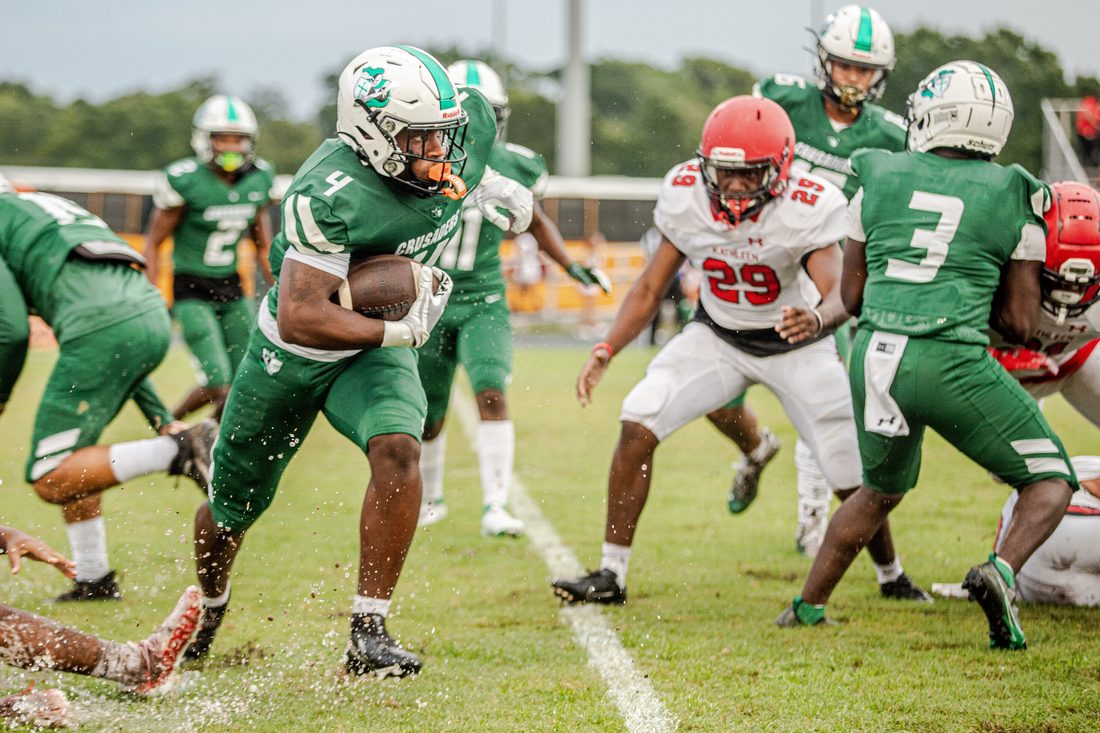 High school football game action — Tampa Bay