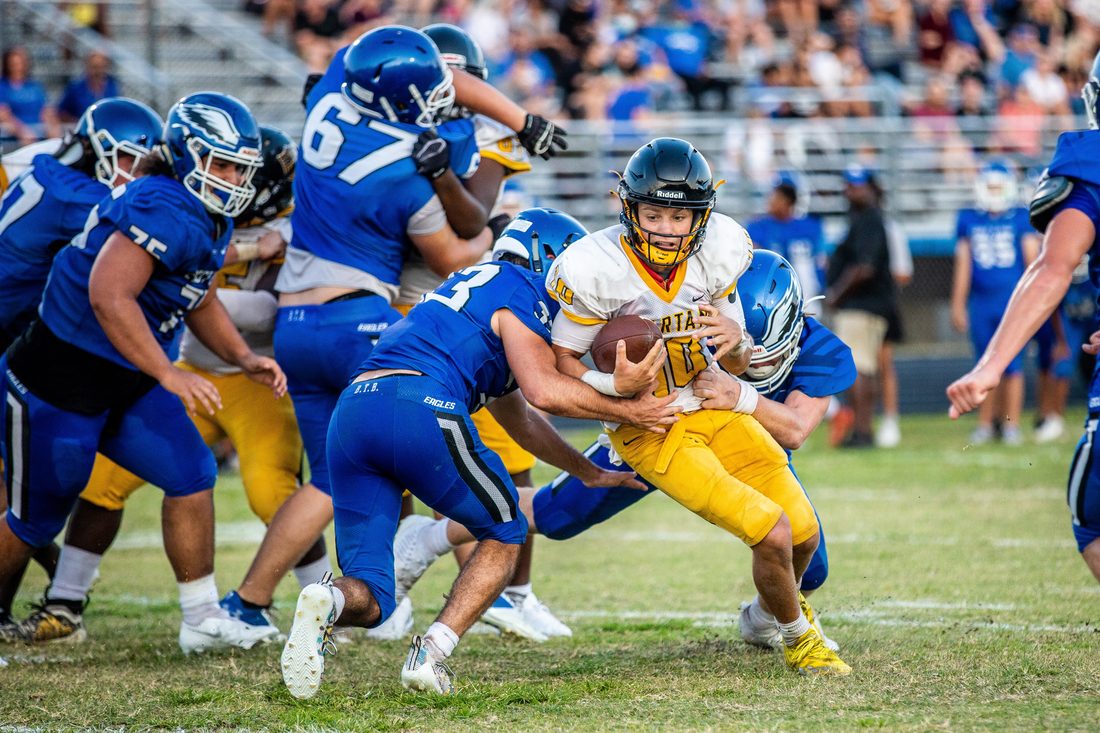 High school football game action — Tampa Bay
