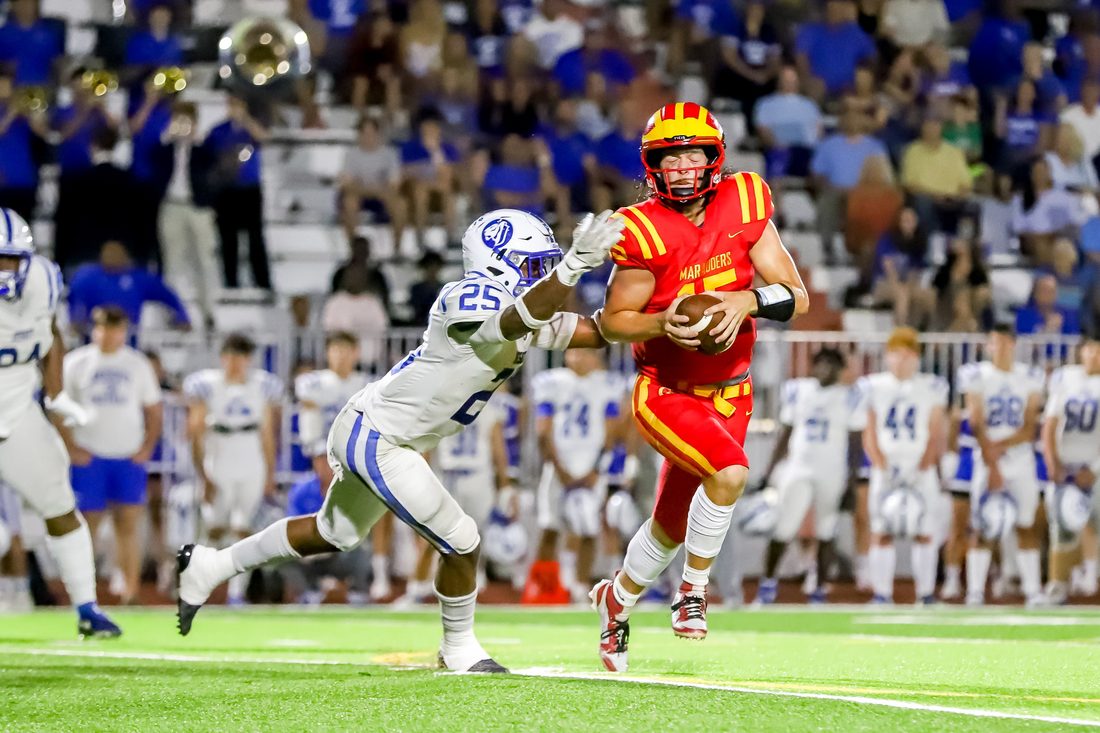 High school football game action — Tampa Bay
