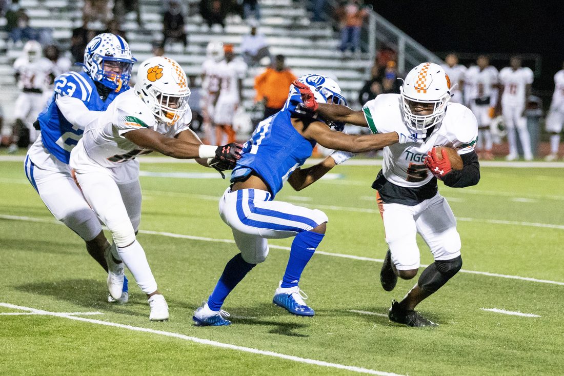 High school football game action — Tampa Bay