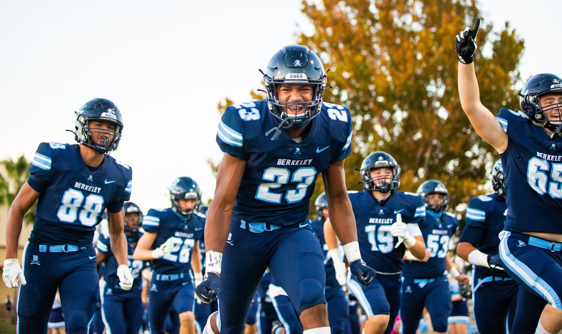 High school football game action — Tampa Bay