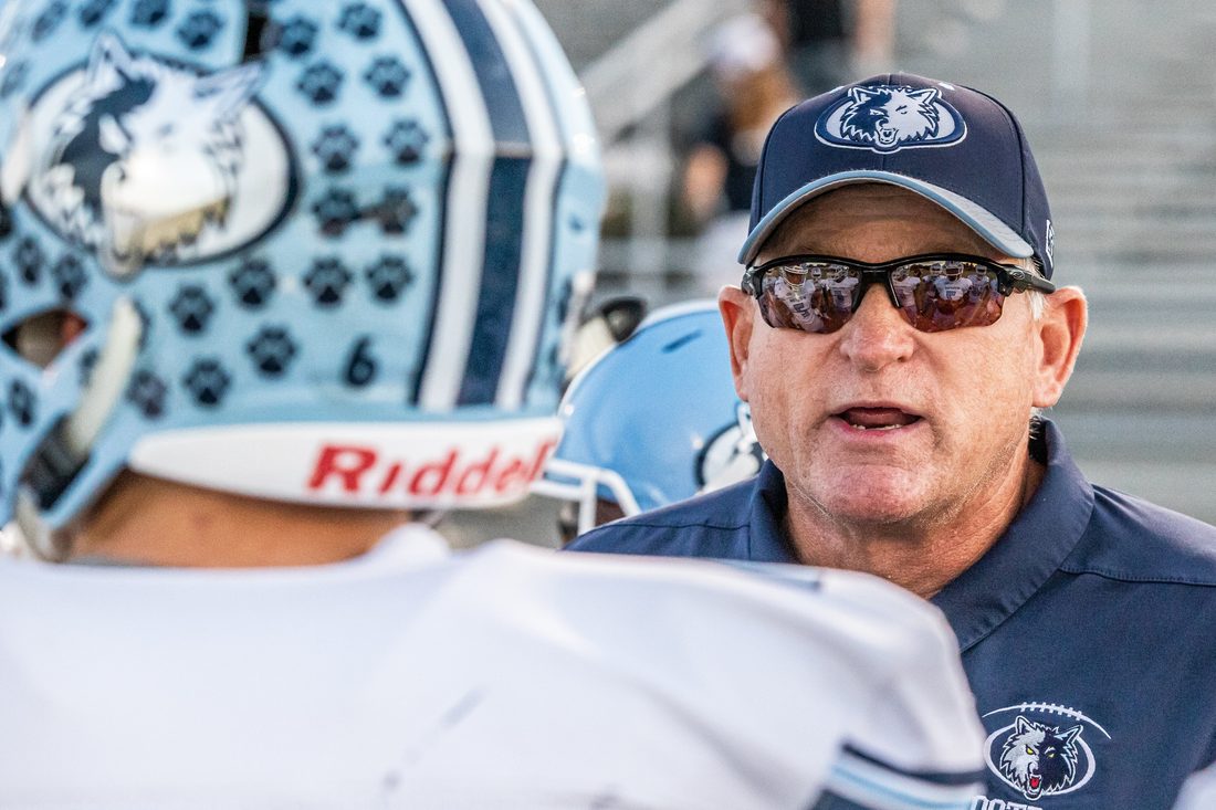High school football game action — Tampa Bay