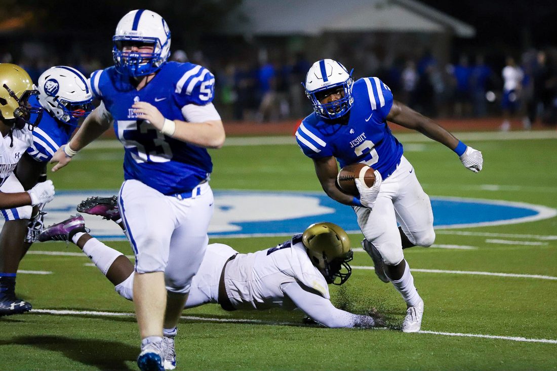High school football game action — Tampa Bay