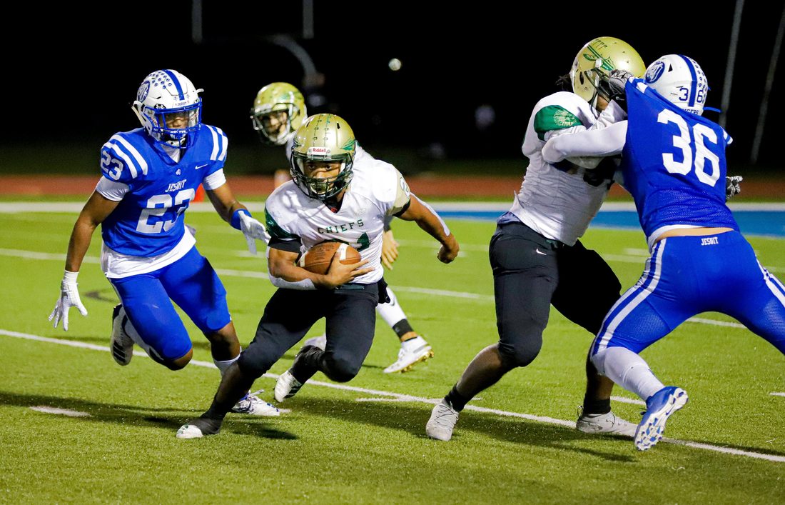High school football game action — Tampa Bay