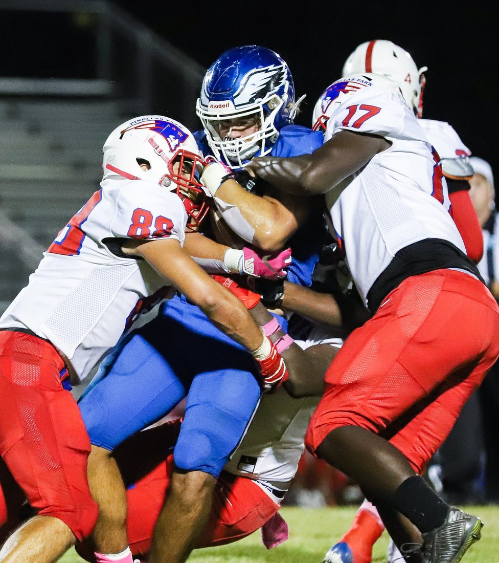 High school football game action — Tampa Bay