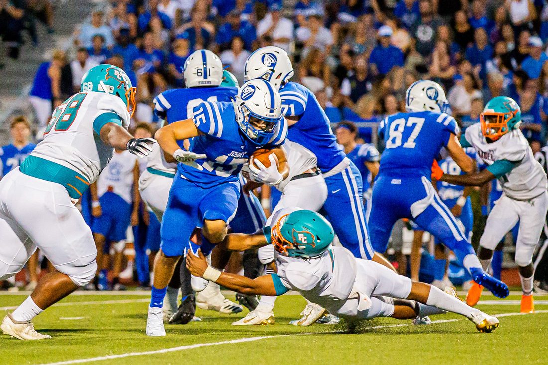 High school football game action — Tampa Bay