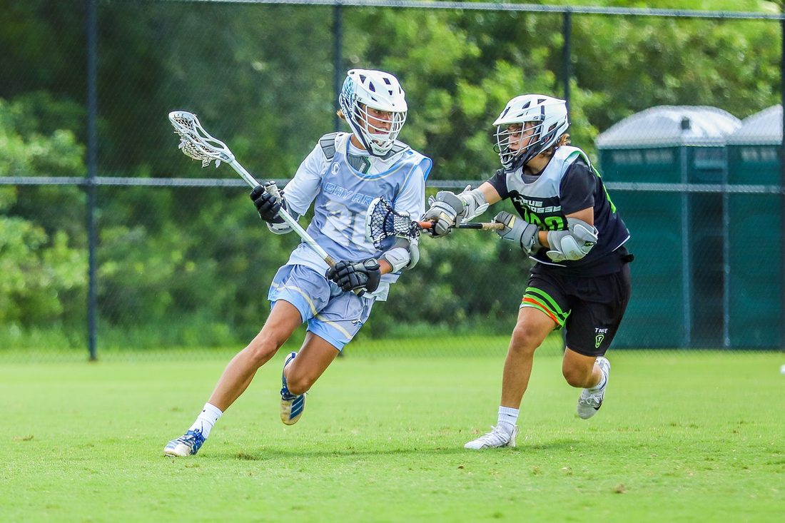 High school lacrosse game action — Tampa Bay