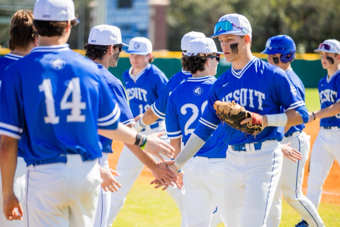 Jesuit baseball players competing in an intersquad match