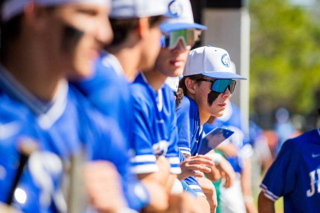 Jesuit baseball players competing in an intersquad match