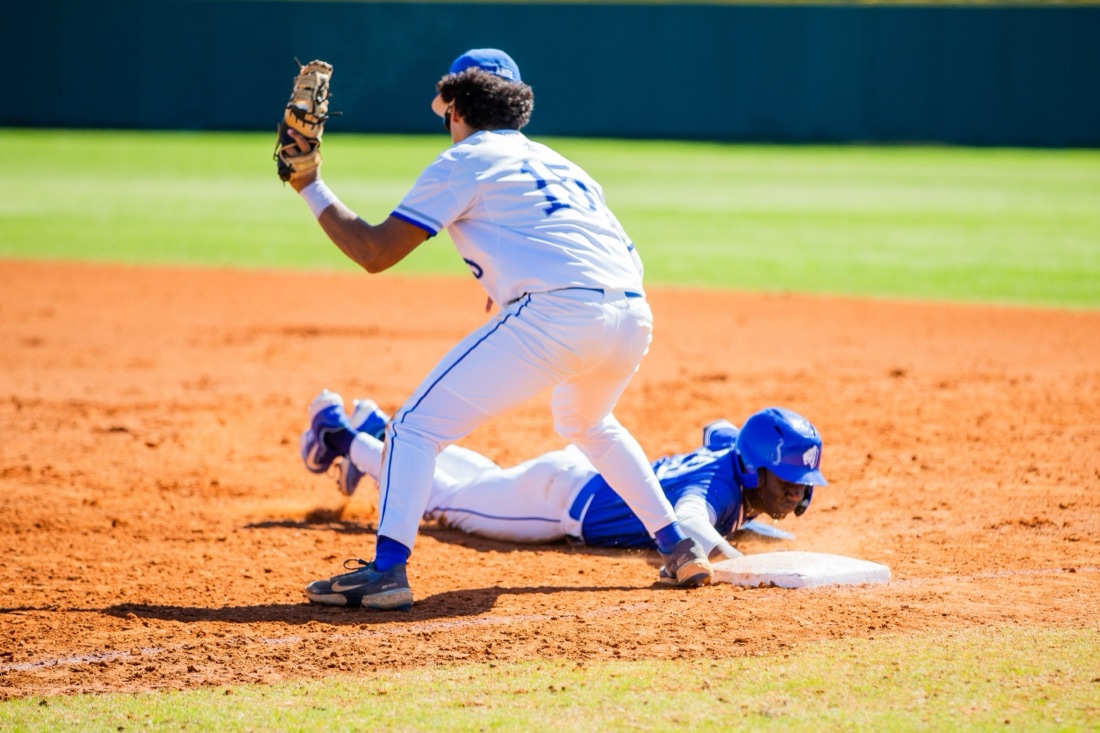 Jesuit baseball players competing in an intersquad match