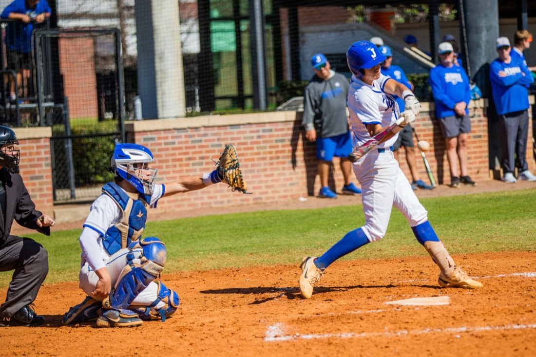 Jesuit baseball players competing in an intersquad match