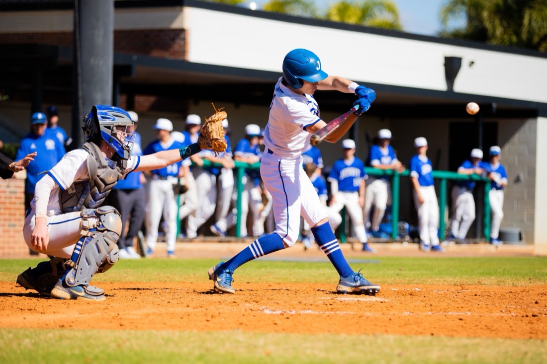 Jesuit baseball players competing in an intersquad match