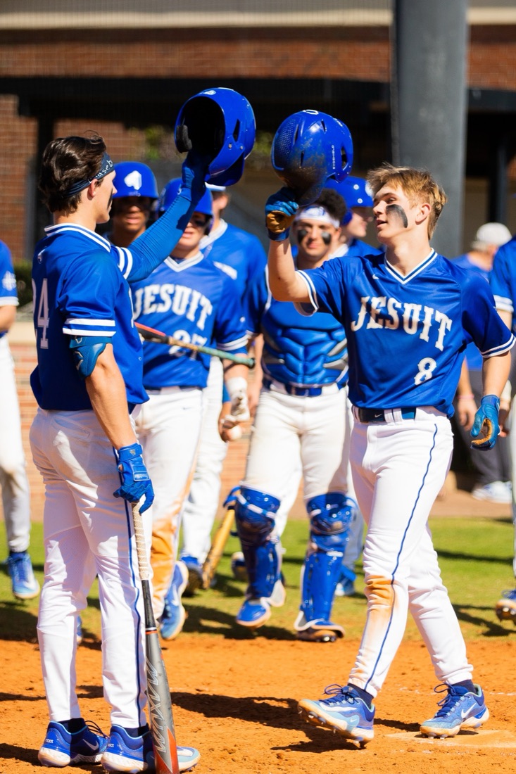 Jesuit baseball players competing in an intersquad match