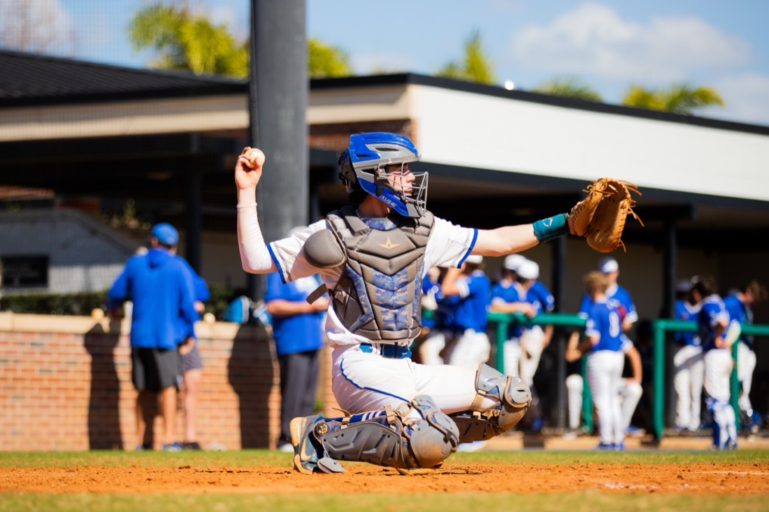 Jesuit baseball players competing in an intersquad match