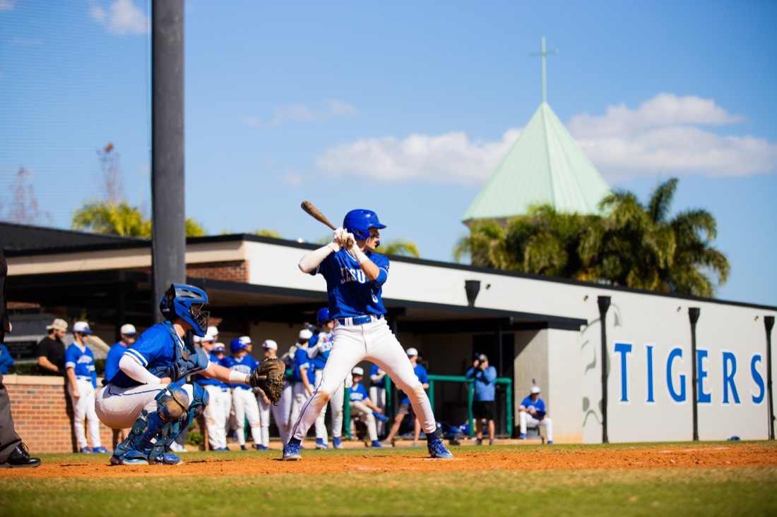 Jesuit baseball players competing in an intersquad match