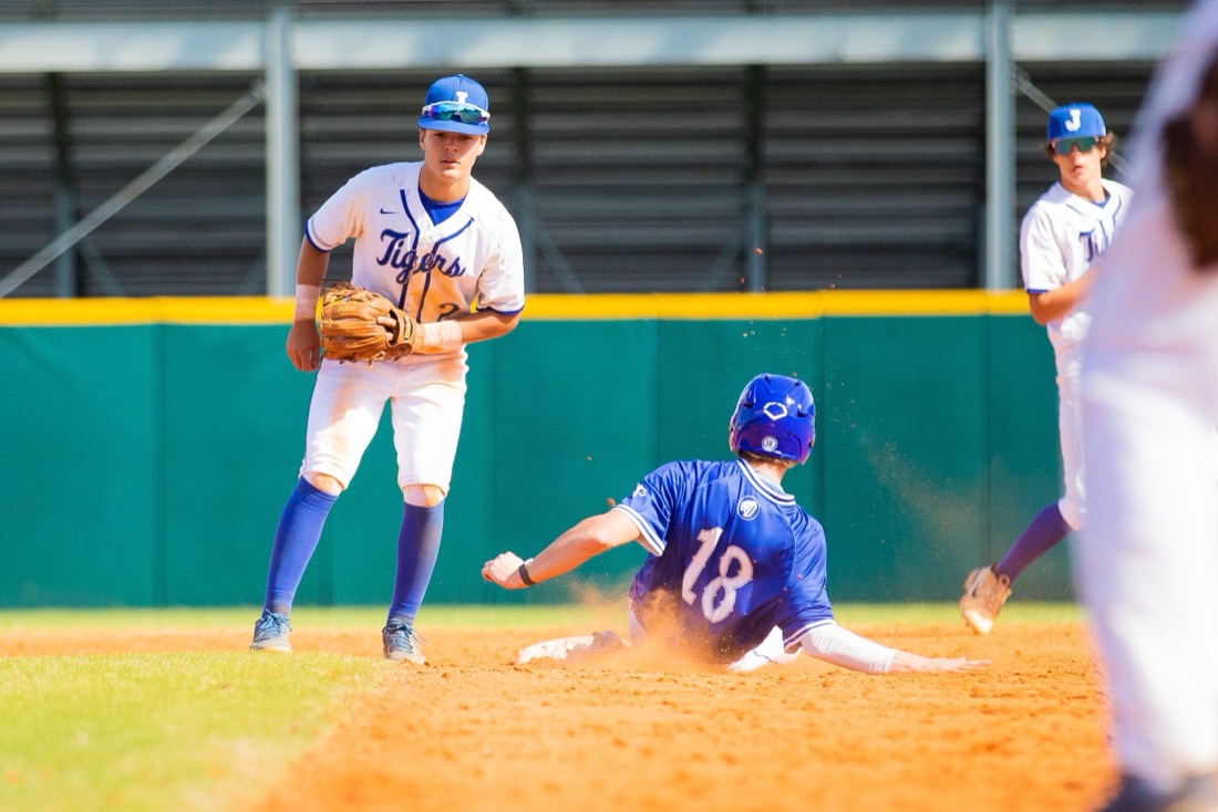 Jesuit baseball players competing in an intersquad match