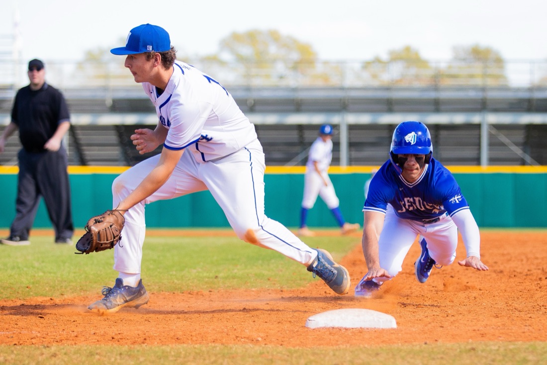 Jesuit baseball players competing in an intersquad match
