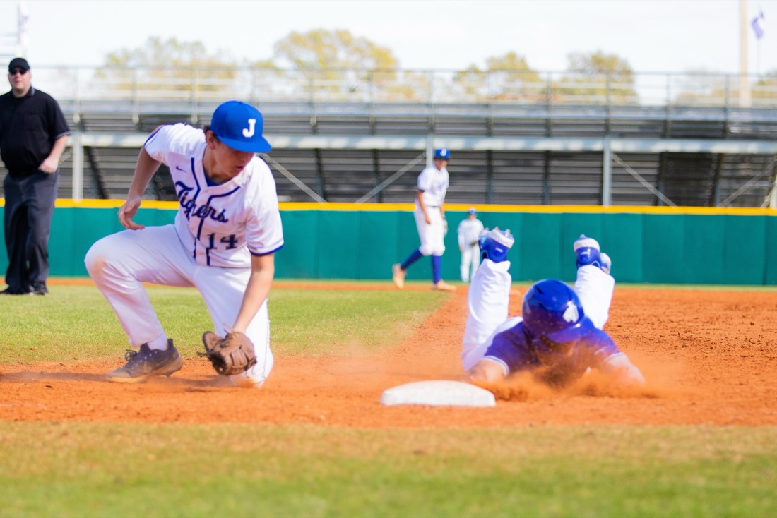 Jesuit baseball players competing in an intersquad match