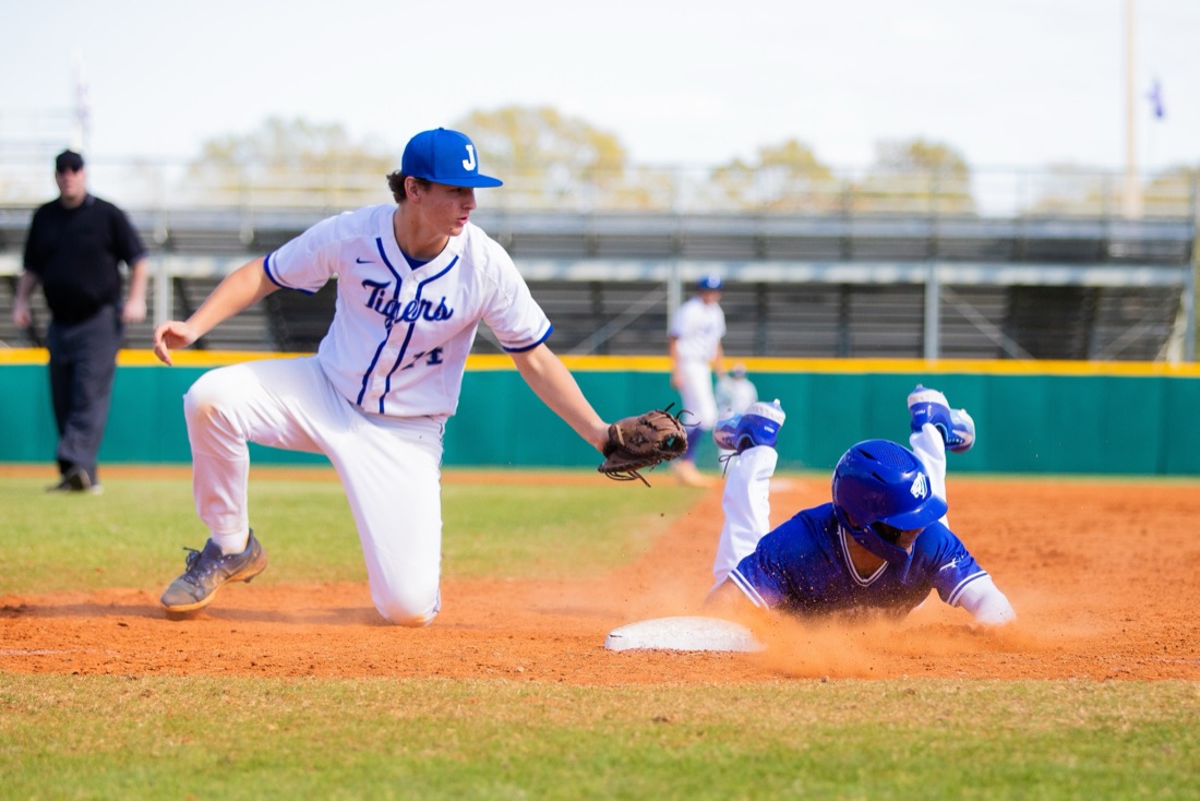 Jesuit baseball players competing in an intersquad match