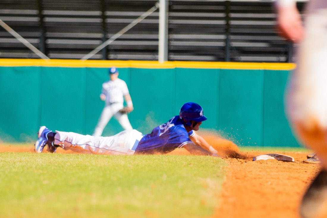 Jesuit baseball players competing in an intersquad match