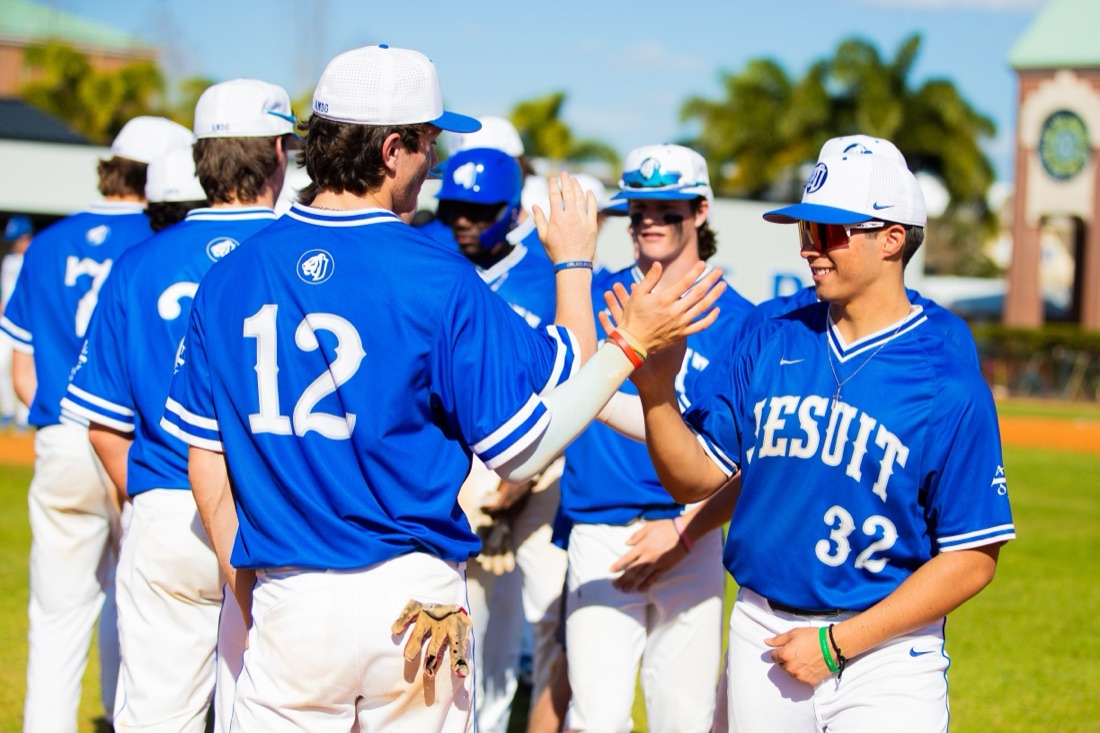 Jesuit baseball players competing in an intersquad match