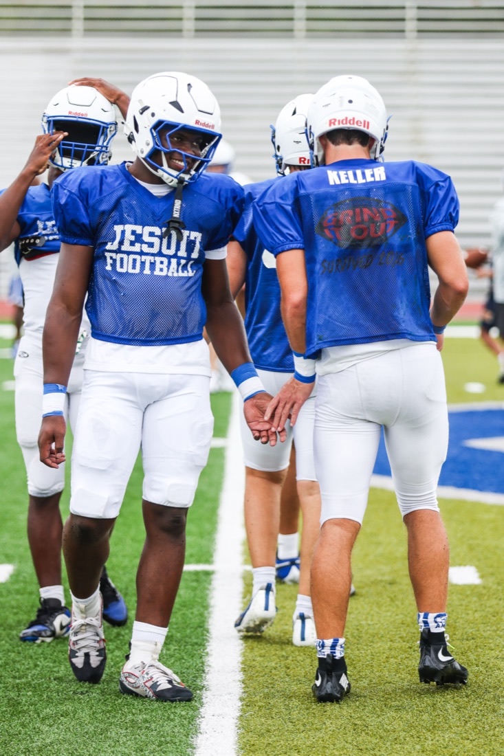 Jesuit football team working through an on-field practice session