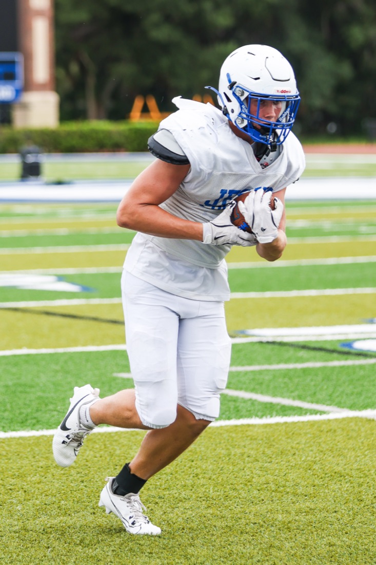 Jesuit football team working through an on-field practice session