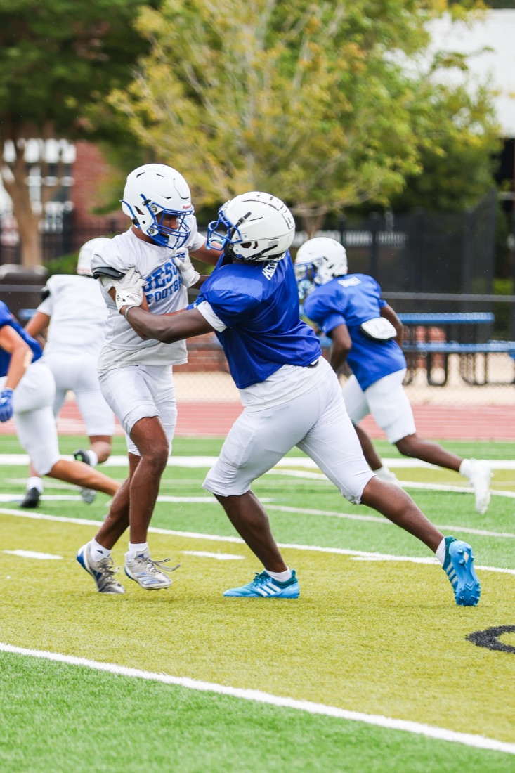 Jesuit football team working through an on-field practice session