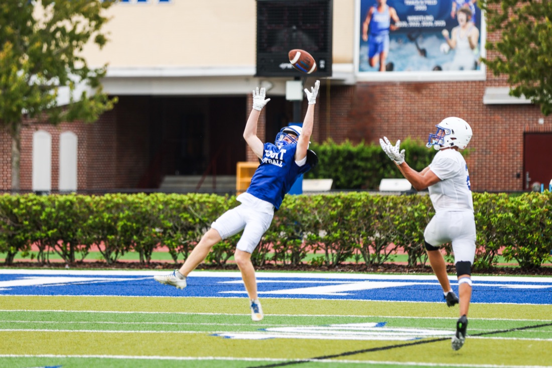 Jesuit football team working through an on-field practice session