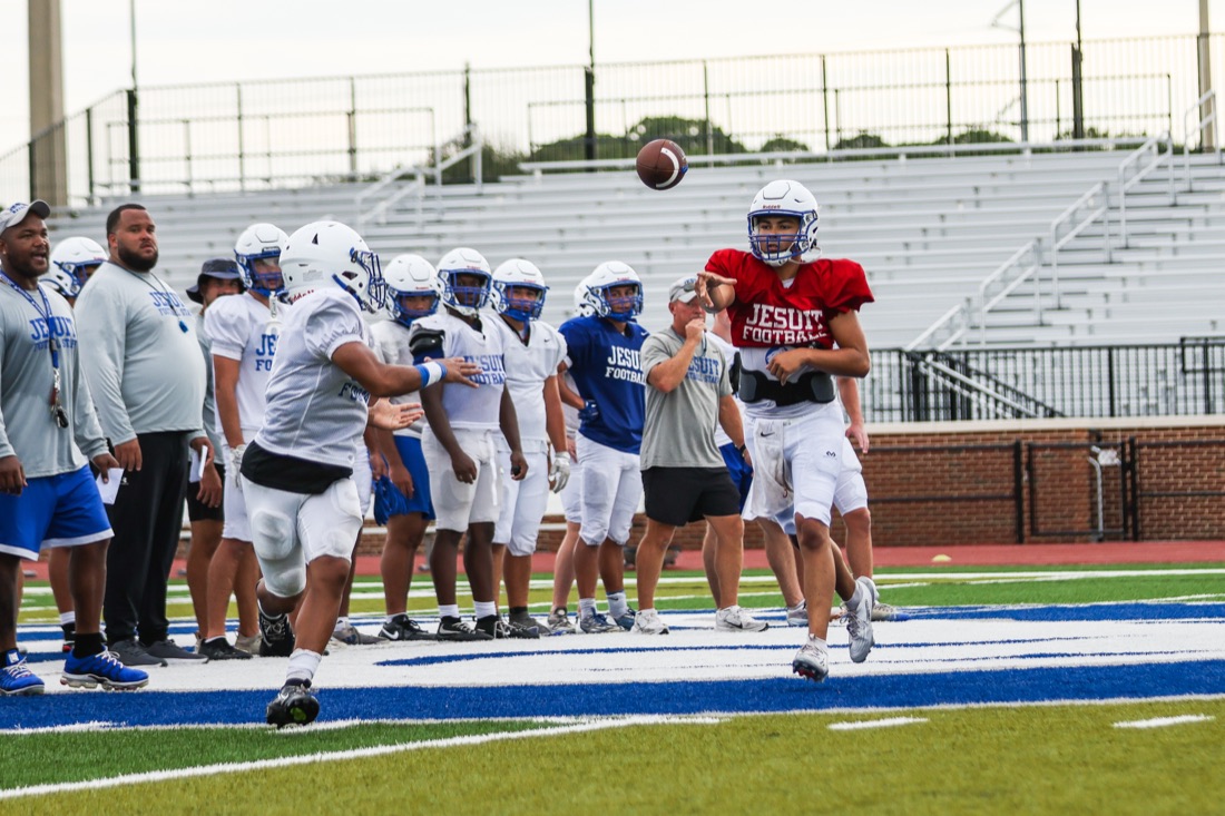 Jesuit football team working through an on-field practice session