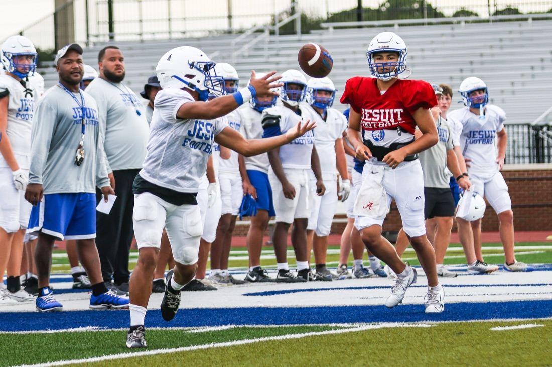 Jesuit football team working through an on-field practice session