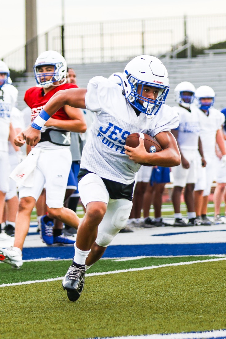 Jesuit football team working through an on-field practice session