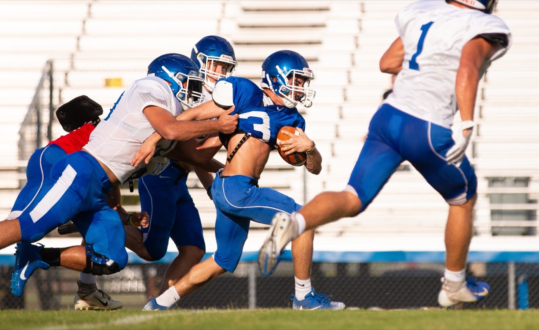 High school football practice — drills and live reps
