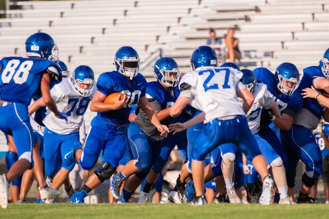 High school football practice — drills and live reps