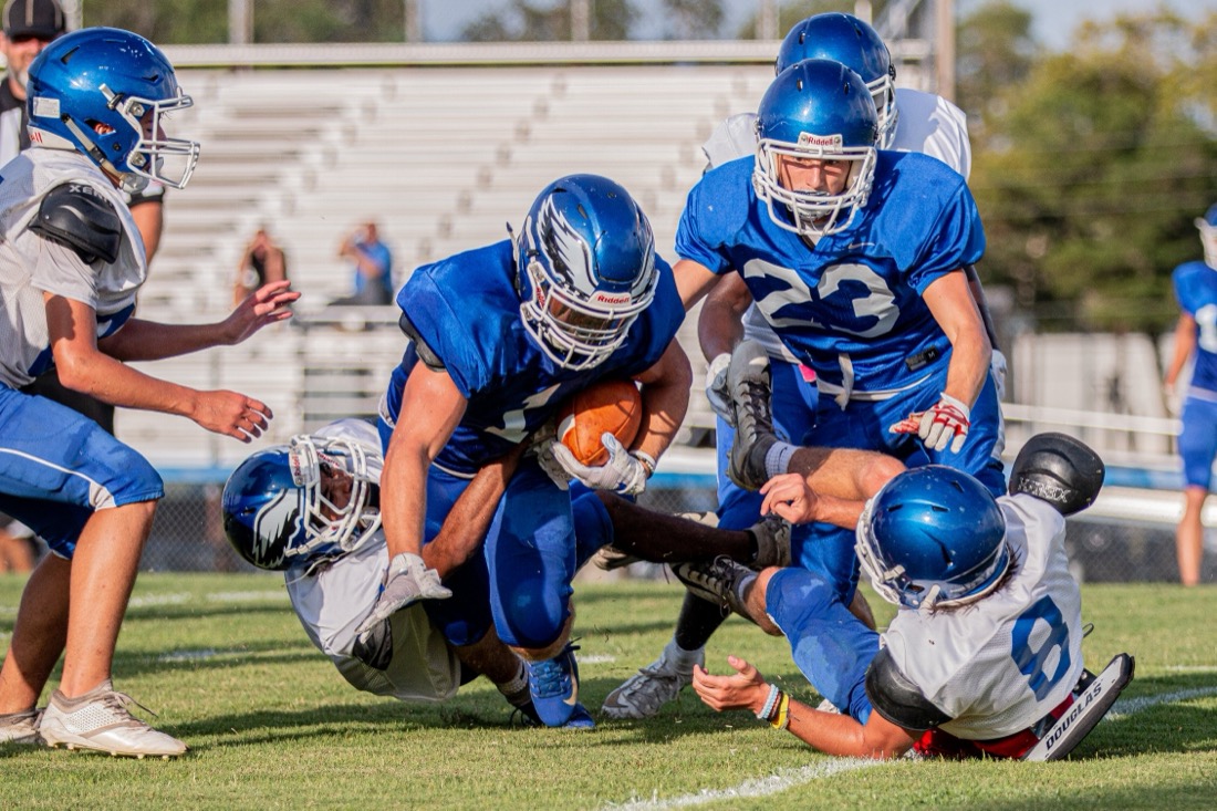 High school football practice — drills and live reps