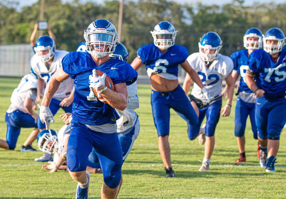 High school football practice — drills and live reps