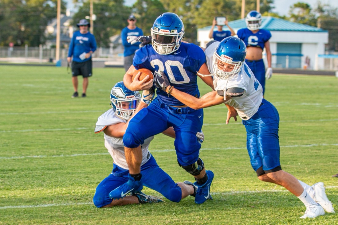 High school football practice — drills and live reps