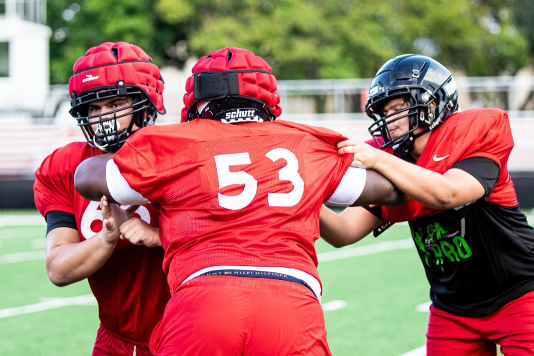 High school football preseason practice — position and contact drills