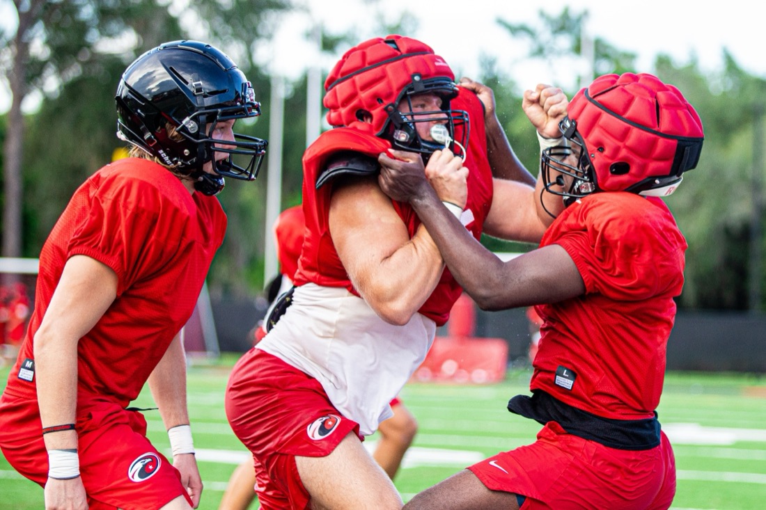 High school football preseason practice — position and contact drills