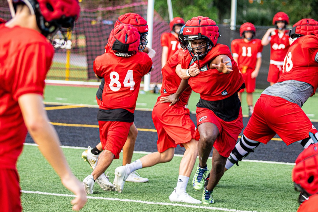 High school football preseason practice — position and contact drills