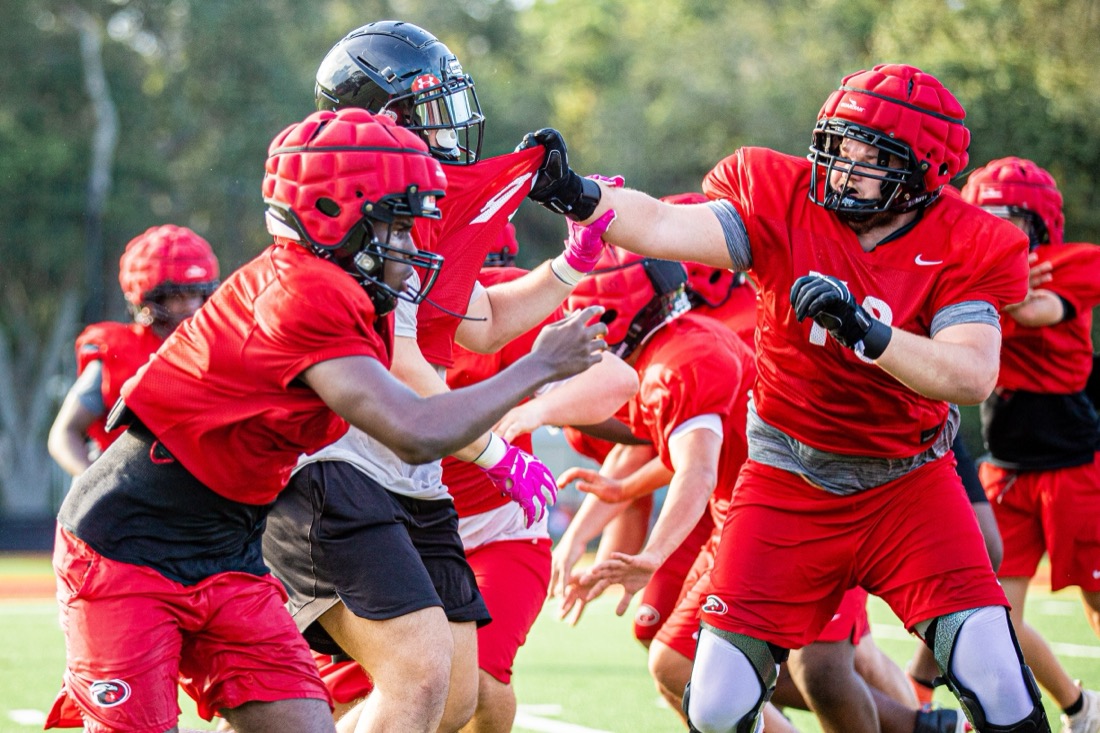 High school football preseason practice — position and contact drills