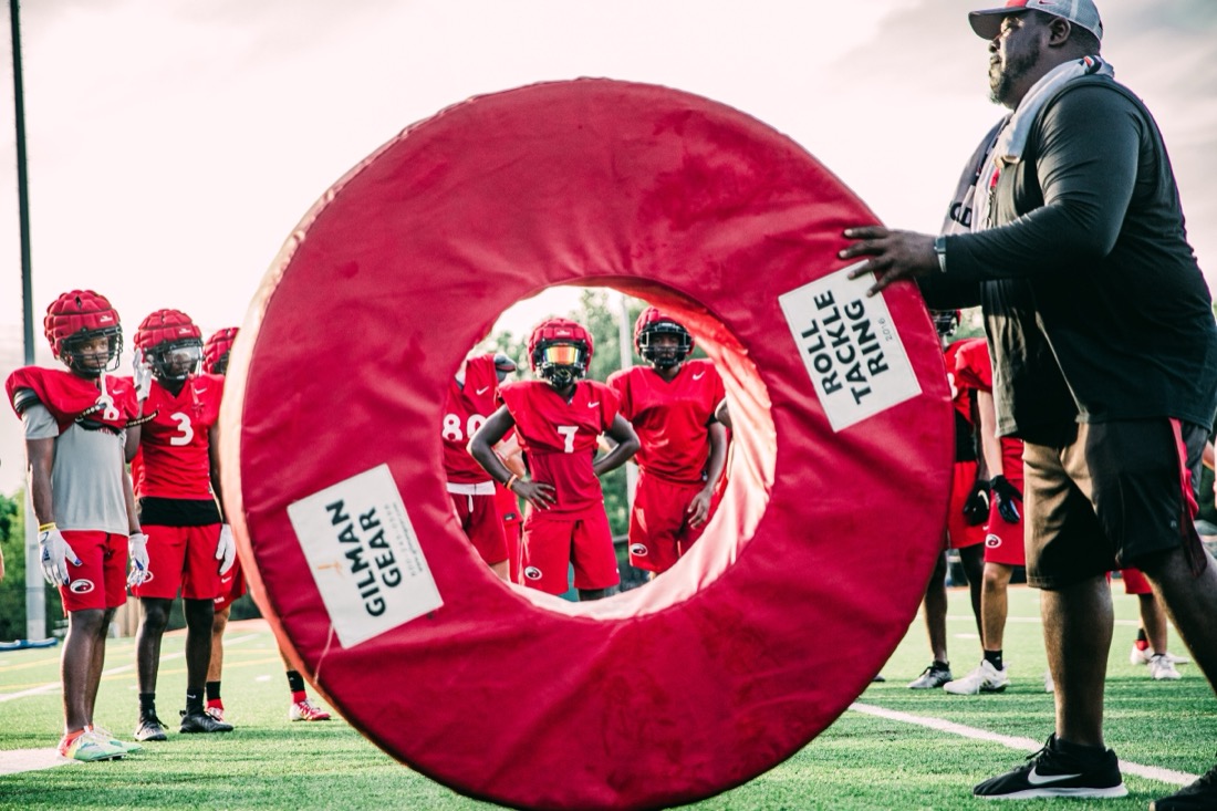 High school football preseason practice — position and contact drills