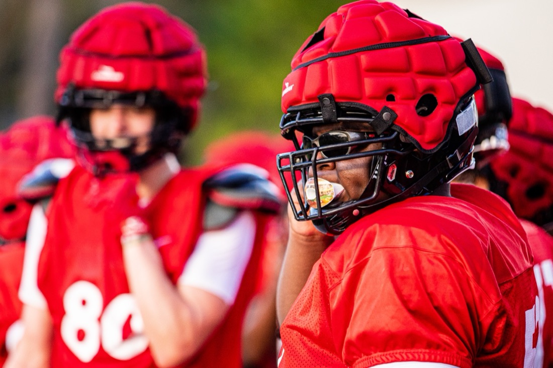 High school football preseason practice — position and contact drills